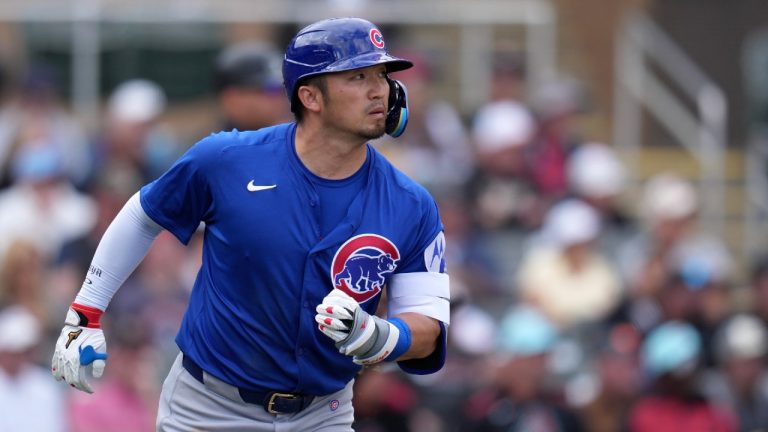 Chicago Cubs' Seiya Suzuki, of Japan, watches the flight of a fly ball out against the Arizona Diamondbacks during the third inning of a spring training baseball game Monday, March 3, 2025, in Scottsdale, Ariz. (Ross D. Franklin/AP)