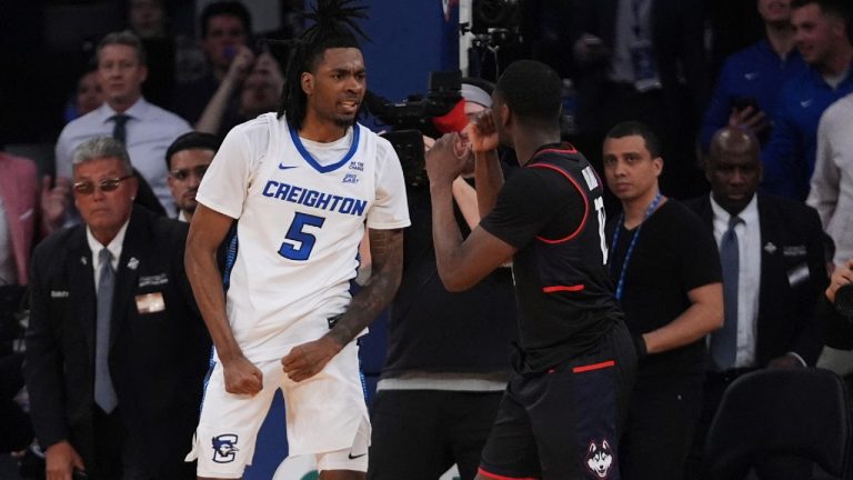 Creighton's Jamiya Neal (5) exchanges words with UConn's Hassan Diarra (10) during the second half of an NCAA college basketball game in the semifinals of the Big East tournament Friday, March 14, 2025, in New York. (Frank Franklin II/AP)