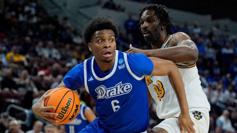 Drake guard Tavion Banks (6) drives past Missouri centre Josh Gray (33) during the first half of the first round of the NCAA college basketball tournament, Thursday, March 20, 2025, in Wichita, Kan. (Charlie Riedel/AP)