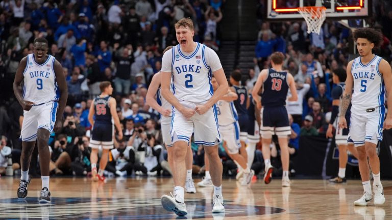 Duke forward Cooper Flagg (2) reacts after making a three point basket against Arizona to end the first half of a Sweet 16 round NCAA college basketball tournament game, Thursday, March 27, 2025, in Newark, N.J. (Frank Franklin II/AP)