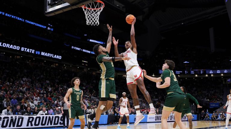 Maryland forward Julian Reese, centre, shoots against Colorado State forwards Jaylen Crocker-Johnson, second from left, and Kyle Jorgensen during the first half in the second round of the NCAA college basketball tournament. (Ryan Sun/AP)