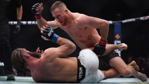 Justin Gaethje fights Rafael Fiziev during a UFC 313 mixed martial arts lightweight bout in Las Vegas. (John Locher/AP)