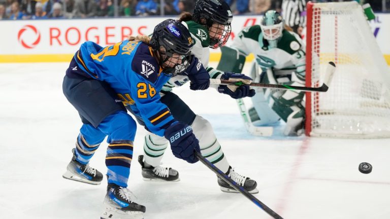 Toronto Sceptres' Kaitlin Willoughby (28) and Boston Fleet's Jessica Digirolamo (22) race towards the puck as Boston goalie Aerin Frankel (31) looks on during second period PWHL hockey action in Toronto on Saturday, Nov. 30, 2024. (Frank Gunn/CP)