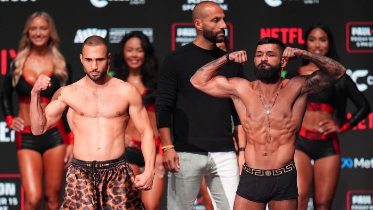 Lucas Bahdi, left, and Armando Casamonica pose for photos during a weigh-in ahead of their super lightweight bout, Thursday, Nov. 14, 2024, in Irving, Texas. (AP Photo/Julio Cortez)