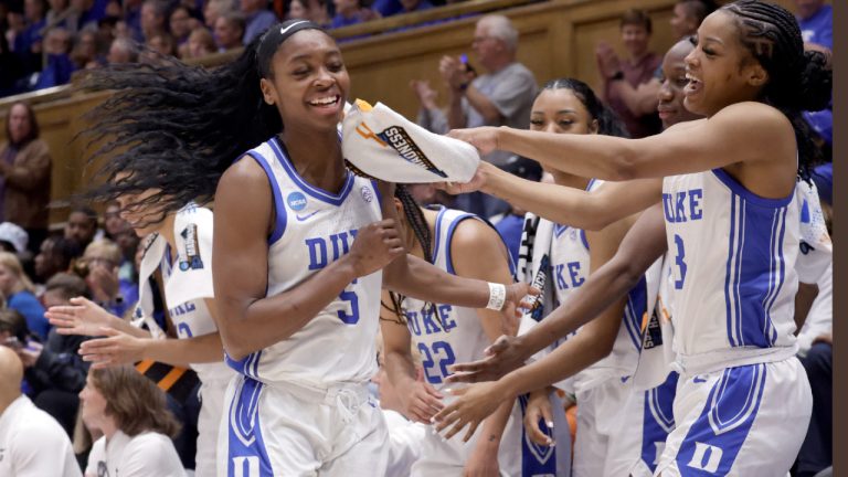 Duke guard Oluchi Okananwa (5) is congratulated by her teamates as she comes out of the game during the second half in the first round of the NCAA college basketball tournament against Lehigh, Friday, March 21, 2025, in Durham N.C. (Chris Seward/AP)