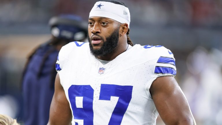 Dallas Cowboys defensive tackle Osa Odighizuwa (97) warms up before an NFL football game against the Houston Texans in Arlington, Texas, Monday, Nov. 18, 2024. (AP Photo/Gareth Patterson)