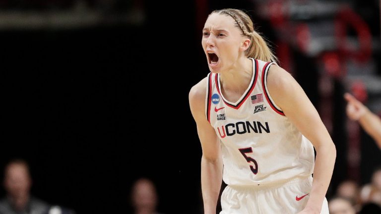 UConn guard Paige Bueckers (5) reacts after scoring a basket during the second half against Oklahoma in the Sweet 16 of the NCAA college basketball tournament, Saturday, March 29, 2025, in Spokane, Wash. (AP Photo/Young Kwak)