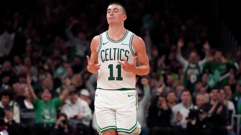 Boston Celtics guard Payton Pritchard (11) celebrates after hitting a 3-pointer against the Portland Trail Blazers during the second half of an NBA basketball game, Wednesday, March 5, 2025, in Boston. (AP Photo/Charles Krupa)