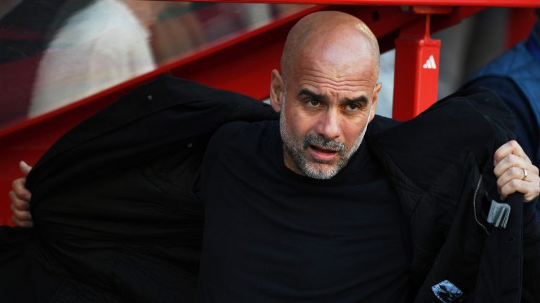Manchester City's head coach Pep Guardiola arrives the bench prior to the English Premier League soccer match between Nottingham Forest and Manchester City at the City Ground stadium in Nottingham, England, Saturday, March 8, 2025. (Rui Vieira/AP)