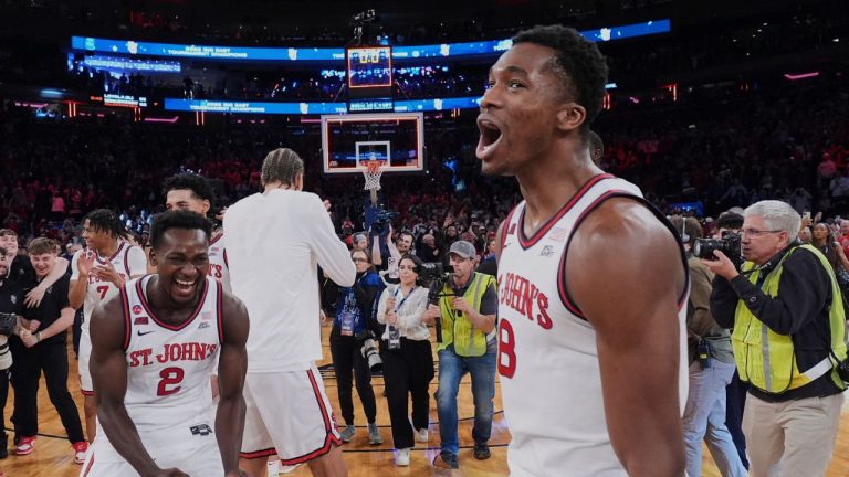 St. John's Sadiku Ibine Ayo (2) and Vince Iwuchukwu (8) celebrate after an NCAA college basketball game against Creighton in the championship of the Big East Conference tournament Saturday, March 15, 2025, in New York. (Frank Franklin II/AP)