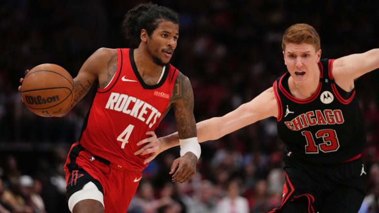 Chicago Bulls guard Kevin Huerter (13) defends against Houston Rockets guard Jalen Green (4) during the first half of an NBA basketball game in Houston, Saturday, March 15, 2025. (Ashley Landis/AP)