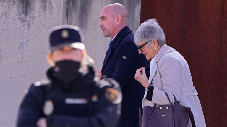 The former president of Spain's soccer federation Luis Rubiales, centre, leaves a court with his lawyer Olga Tubau on the outskirts of Madrid, Spain, Monday Feb. 3, 2025 where he is on trial for his unsolicited kiss on forward Jenni Hermoso. (Manu Fernandez/AP)