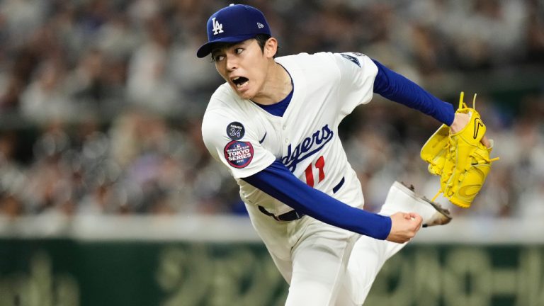 Los Angeles Dodgers starting pitcher Roki Sasaki throws to the Chicago Cubs during his Major League debut in the first inning of an MLB Tokyo Series baseball game in Tokyo, Japan, Wednesday, March 19, 2025. (Hiro Komae/AP)
