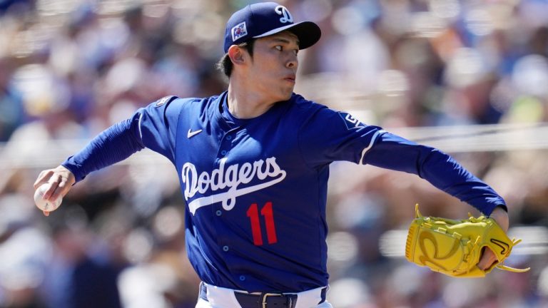 Los Angeles Dodgers starting pitcher Roki Sasaki, of Japan, throws against the Cleveland Guardians during the first inning of a spring training baseball game Tuesday, March 11, 2025, in Phoenix. (Ross D. Franklin/AP)