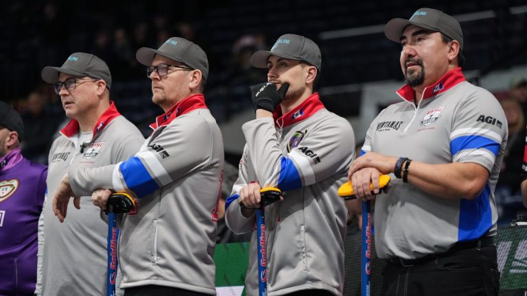 Northwest Territories skip Aaron Bartling, from left to right, third D'arcy Delorey, lead Eric Preston and second Norman Bassett stand together before playing Ontario during the Brier, in Kelowna, B.C., on Sunday, March 2, 2025. (Darryl Dyck/CP)
