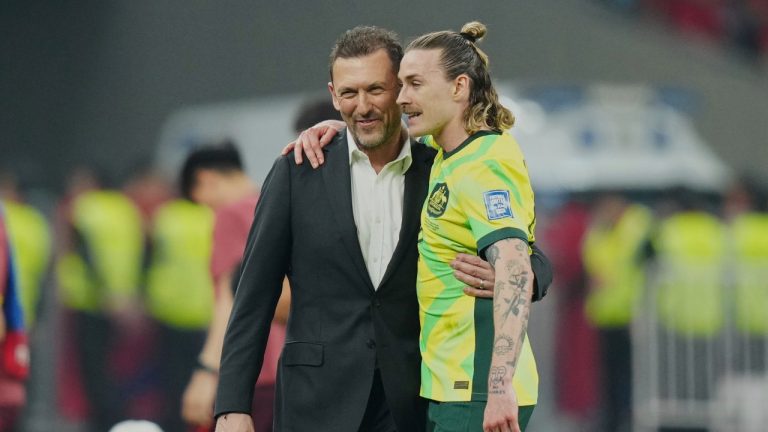 Australia's head coach Tony Popovic, left reacts with Australia's Jackson Irvine after winning a World Cup 2026 group C qualifier match against China held at the Hangzhou Olympic Sports Centre Stadium in Hangzhou, in eastern China's Zhejiang province, on Tuesday, March 25, 2025. (AP Photo)