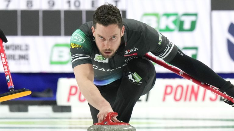 Canada's Brett Gallant throws a stone during his country's country's session against South Korea, at the World Men's Curling Championship in Moose Jaw, Sask., Sunday, March 30, 2025. (Chris Young/CP)