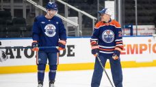 Prime Minister Mark Carney joins Oilers on ice for morning skate