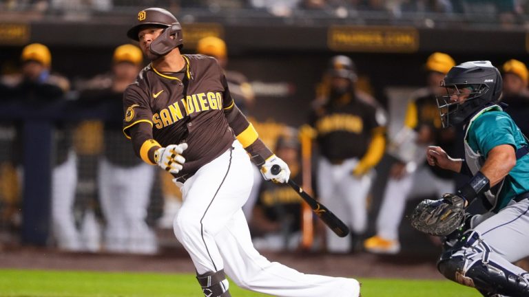 San Diego Padres' Yuli Gurriel follows through during an at-bat against the Seattle Mariners in a spring training baseball game Friday, Feb. 28, 2025, in Peoria, Ariz. (Lindsey Wasson/AP)