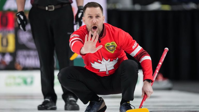 Canada skip Brad Gushue calls out to the sweepers while playing New Brunswick during the Brier, in Kelowna, B.C., on Tuesday, March 4, 2025. (Darryl Dyck/CP)