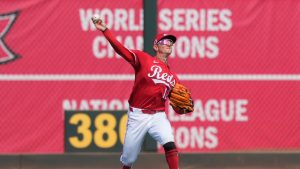 Cincinnati Reds left fielder Austin Hays throws the ball after catching a fly ball hit by San Diego Padres' Gavin Sheets during the first inning of a spring training baseball game, Saturday, March, 1, 2025, in Goodyear, Ariz. (Carolyn Kaster/AP)