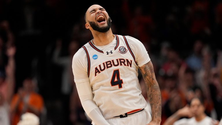 Auburn forward Johni Broome (4) reacts to play against Michigan State during the second half in the Elite Eight of the NCAA college basketball tournament, Sunday, March 30, 2025, in Atlanta. (George Walker IV/AP)