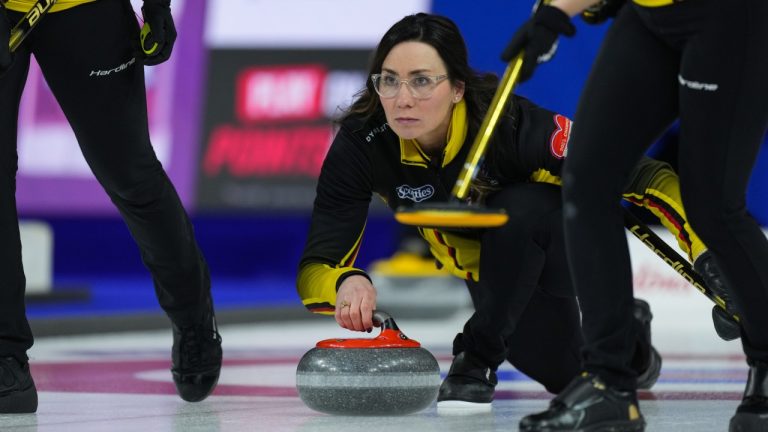 Andrea Kelly, skipping New Brunswick, delivers a rock while playing Ontario at the Scotties Tournament of Hearts, in Kamloops, B.C., on Thursday, February 23, 2023. (Darryl Dyck/CP)