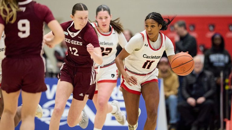 University of Carleton Ravens' Kyana-Jade Poulin moves the ball up the court against the University of Ottawa Gee-Gees during U Sports women's basketball action in Ottawa in this March 8, 2025 handout photo. (Marc Lafleur/Handout/CP) 