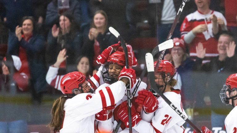 Wisconsin's Laila Edwards, centre, celebrates with Katie Kotlowski (24) and Kirsten Simms (27) after Edwards scored against Ohio State during the third period of a college hockey game Saturday, Feb. 24, 2024, Madison, Wis. (Samantha Madar/Wisconsin State Journal via AP, File)