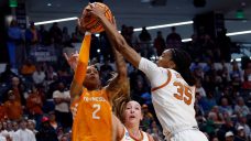 Madison Booker scores 17 to help Texas edge Tennessee in Sweet 16