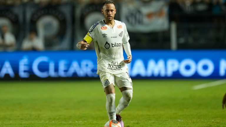 Brazil's Neymar dribbles the ball during his debut for Santos FC in a Sao Paulo league soccer match against Botafogo-SP, in Santos, Brazil, Wednesday, Feb. 5, 2025. (Andre Penner/AP)