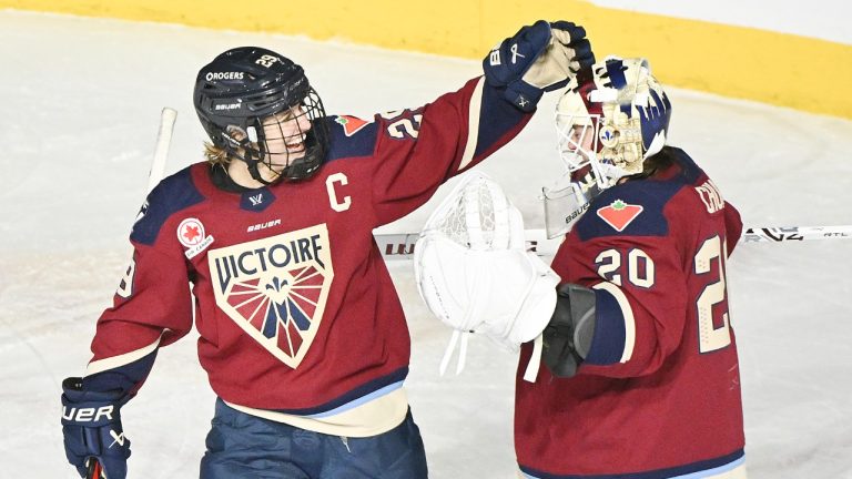 Montreal Victoire's Marie-Philip Poulin (29) celebrates with Victoire goaltender Elaine Chuli after defeating the Toronto Sceptres in a PWHL hockey game in Laval, Que., Thursday, January 30, 2025. (Graham Hughes/CP)