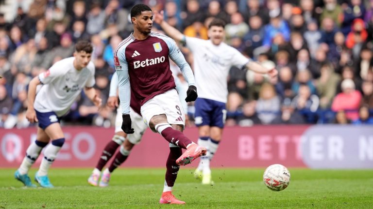 Aston Villa's Marcus Rashford scores their side's second goal of the game from a penalty during the English FA Cup quarter final soccer match against Preston North End at Deepdale, Preston, England, Sunday, March 30, 2025. (Martin Rickett/PA via AP)