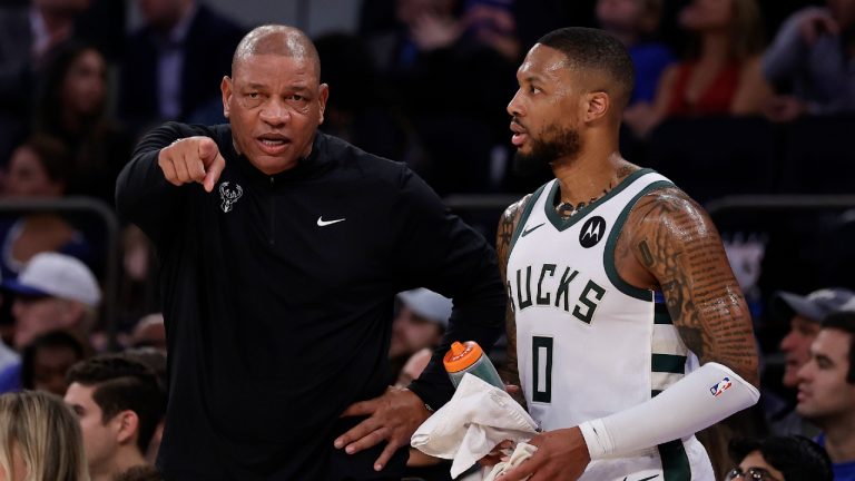 Milwaukee Bucks head coach Doc Rivers talks to Damian Lillard (0) during the first half of an NBA basketball game against the New York Knicks Friday, Nov. 8, 2024, in New York. (Adam Hunger/AP)