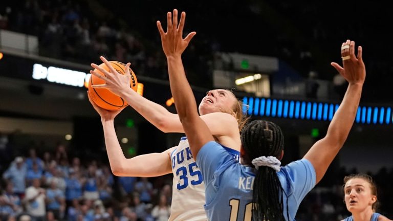 Duke forward Toby Fournier (35) goes to the basket against North Carolina guard Reniya Kelly (10) during the second half in the Sweet 16 of the NCAA college basketball tournament, Friday, March 28, 2025, in Birmingham, Ala. (Gerald Herbert/AP)