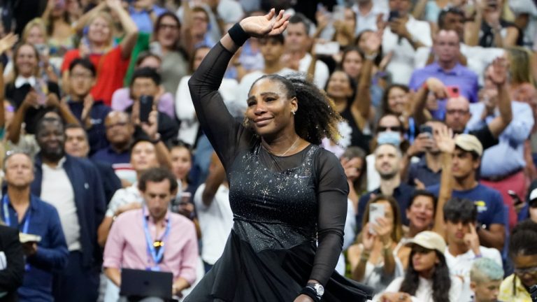 Serena Williams, of the United States, spins as she waves to fans after losing to Ajla Tomljanovic, of Austrailia, in the third round of the U.S. Open tennis championships, Friday, Sept. 2, 2022, in New York. (John Minchillo/AP)