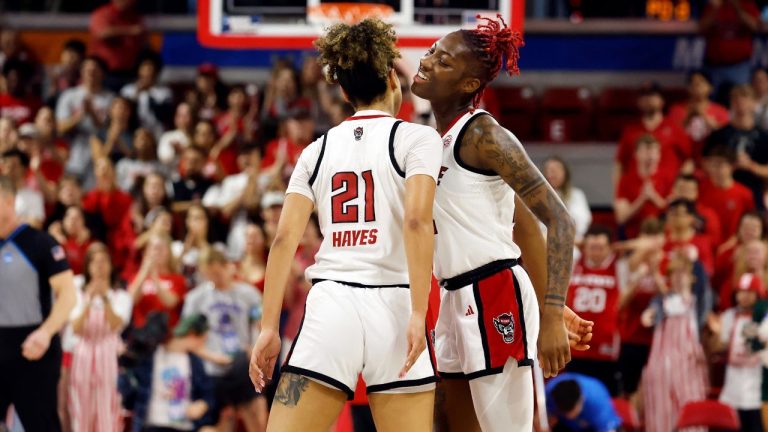 North Carolina State's Saniya Rivers, right, celebrates with teammate Madison Hayes (21) during the first half against Michigan State in the second round of the NCAA college basketball tournament in Raleigh, N.C., Monday, March 24, 2025. (Karl DeBlaker/AP)