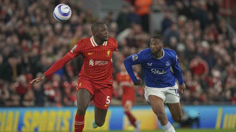 Liverpool's Ibrahima Konate, left, and Everton's Beto battle for the ball during the English Premier League soccer match between Liverpool and Everton at Anfield in Liverpool, Wednesday, April 2, 2025. (Ian Hodgson/AP)