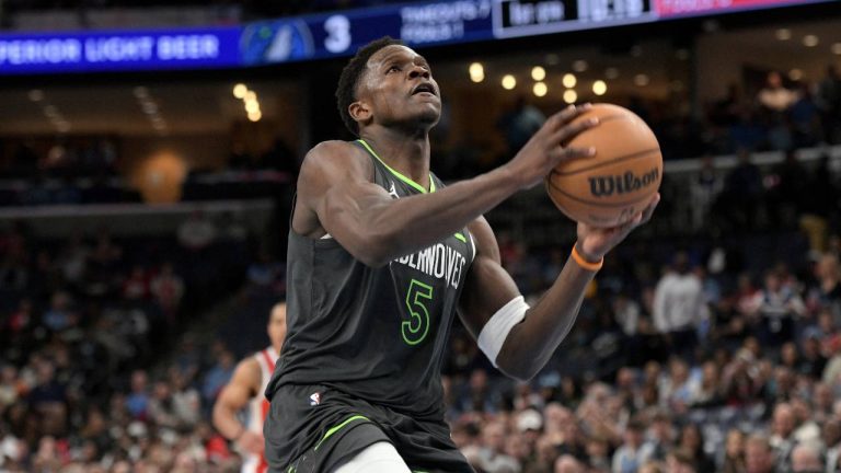 Minnesota Timberwolves guard Anthony Edwards (5) drives to the basket in the first half of an NBA basketball game against the Memphis Grizzlies. (Brandon Dill/AP)