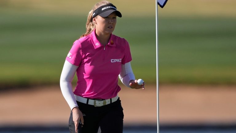 Brooke Henderson, of Canada waves after her shot on the 14th green during the first round of the Ford Championship LPGA golf event, Thursday, March 27, 2025, in Phoenix. (Matt York/AP)