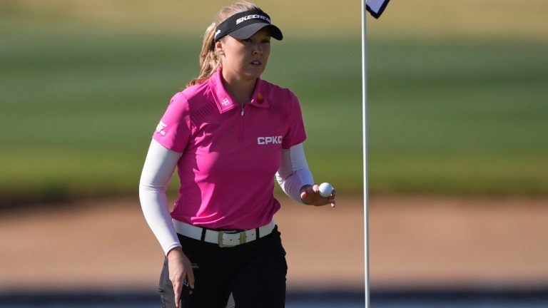 Brooke Henderson, of Canada waves after her shot on the 14th green during the first round of the Ford Championship LPGA golf event, Thursday, March 27, 2025, in Phoenix. (Matt York/AP)