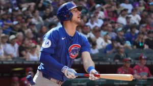 Chicago Cubs outfielder Kyle Tucker (30) hits a home run against the Arizona Diamondbacks in the first inning during a baseball game, Sunday, March 30, 2025, in Phoenix. (Rick Scuteri/AP)