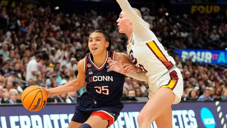 UConn guard Azzi Fudd (35) drives to the basket against South Carolina forward Chloe Kitts (21) during the second half of the national championship game at the Final Four of the women's NCAA college basketball tournament, Sunday, April 6, 2025, in Tampa, Fla. (John Raoux/AP)