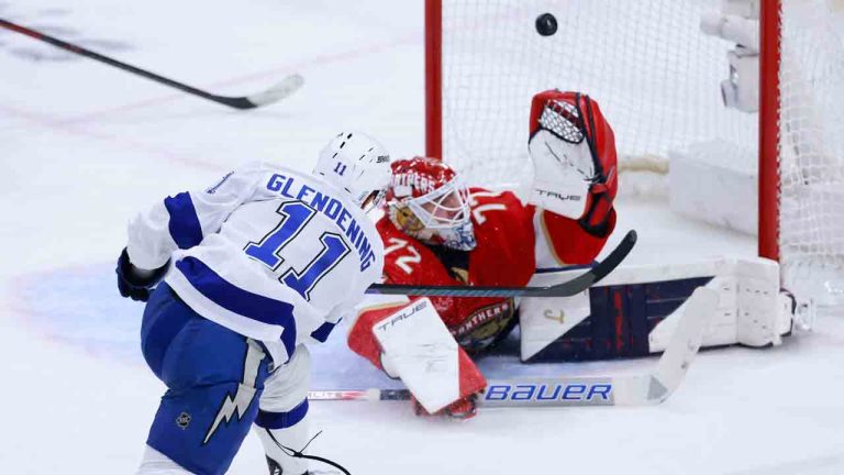 Tampa Bay Lightning centre Luke Glendening (11) scores against Florida Panthers goaltender Sergei Bobrovsky (72) during the third period in Game 3 of an NHL hockey Stanley Cup first-round playoff series, Saturday, April 26, 2025, in Sunrise, Fla. (Rhona Wise/AP)