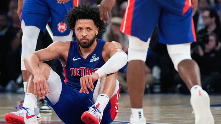 Detroit Pistons guard Cade Cunningham (2) sits after falling during the second half of Game 1 in an NBA basketball first-round playoff series against the New York Knicks, Saturday, April 19, 2025, in New York. (Julia Demaree Nikhinson/AP)