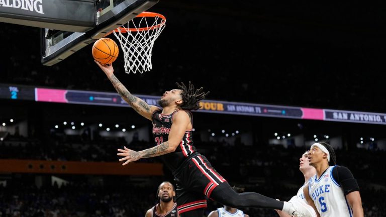 Houston's Emanuel Sharp (21) goes up for a shot against Duke during the second half in the national semifinals at the Final Four of the NCAA college basketball tournament. (Eric Gay/AP)