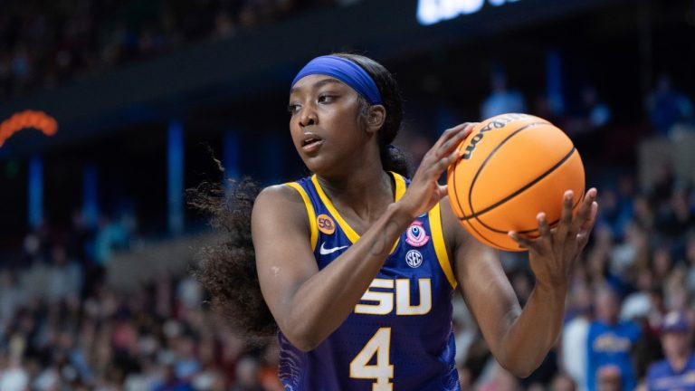 LSU guard Flau'Jae Johnson looks to pass the ball during the second half of a game against UCLA in the Elite Eight of the NCAA college basketball tournament, Sunday, March 30, 2025, in Spokane, Wash. (AP Photo/Jenny Kane)