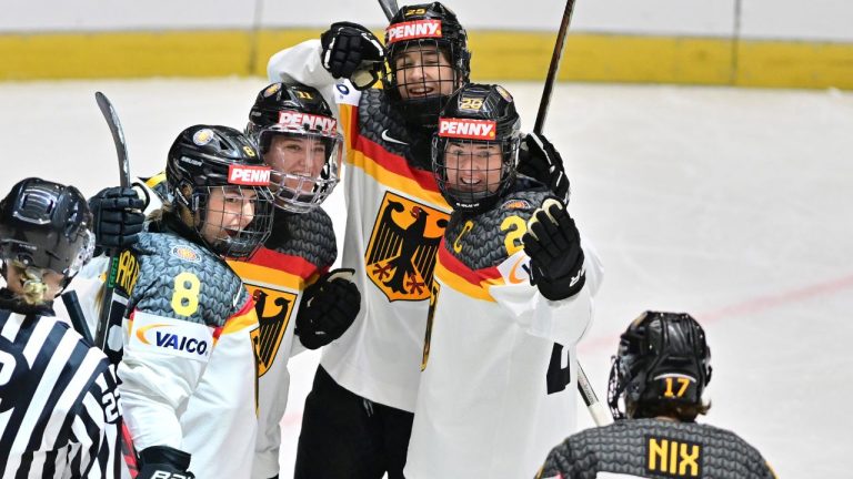 Germany players celebrate their first goal during the ice hockey IIHF Women's World Championship, Group B, match Germany vs Hungary, in Ceske Budejovice, Czech Republic, Monday, April 14, 2025. (Radek Petrasek/CTK via AP)