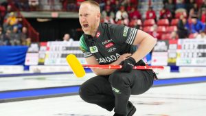Canada skip Brad Jacobs watches his stone against Austria at the BKT World Men's Curling Championship in Moose Jaw, Sask., on Friday, April 4, 2025. (Chris Young/CP)