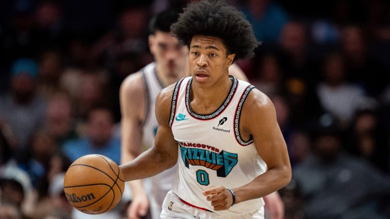 Memphis Grizzlies forward Jaylen Wells (0) brings the ball upcourt during the first half of an NBA basketball game against the Charlotte Hornets. (Jacob Kupferman/AP)